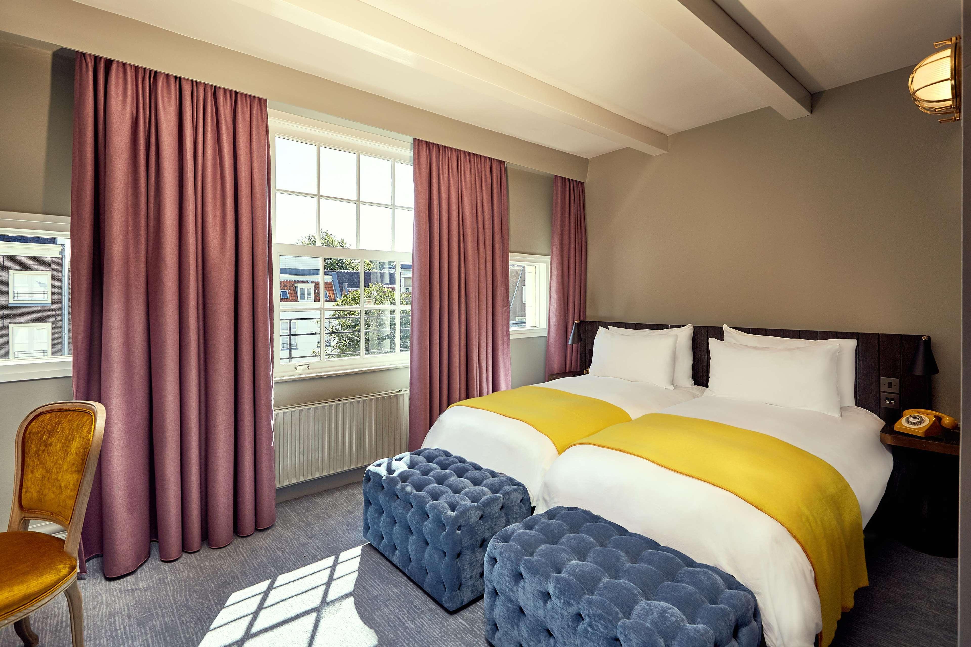Hotel Pulitzer Amsterdam Esterno foto A bedroom at the hotel