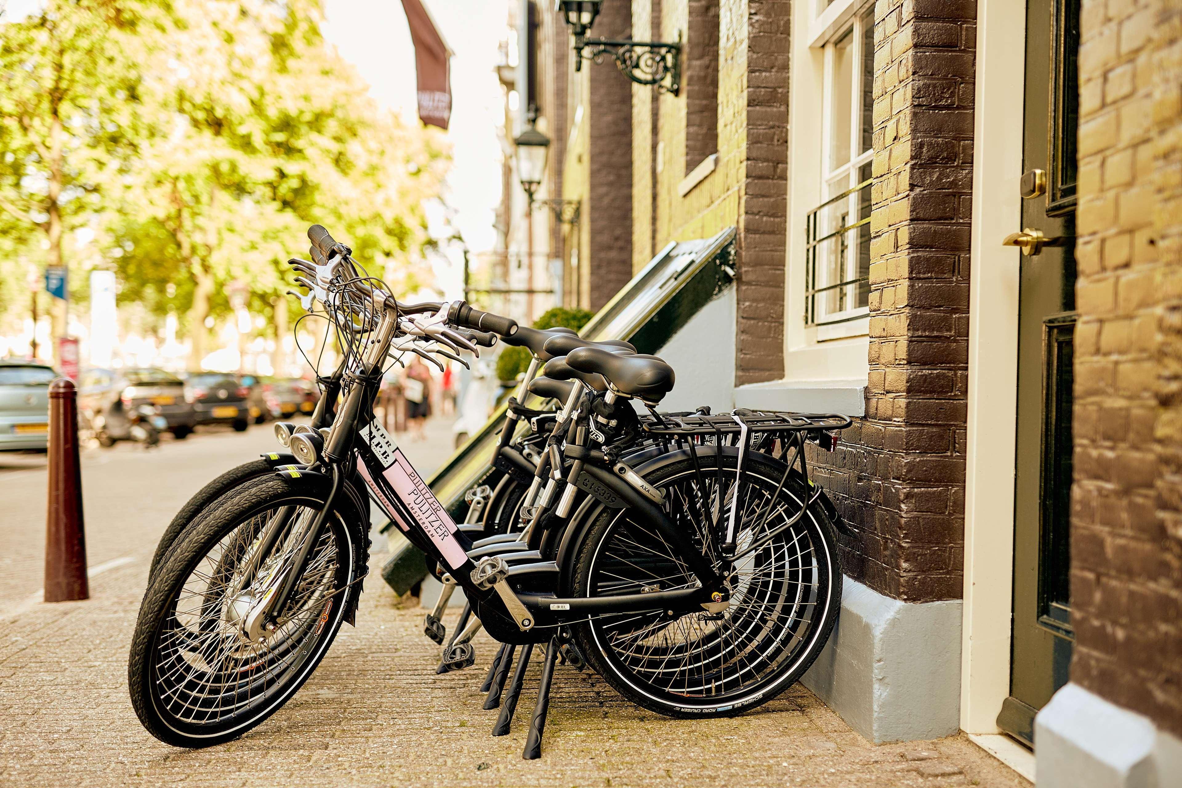 Hotel Pulitzer Amsterdam Esterno foto A Qonger electric bicycle